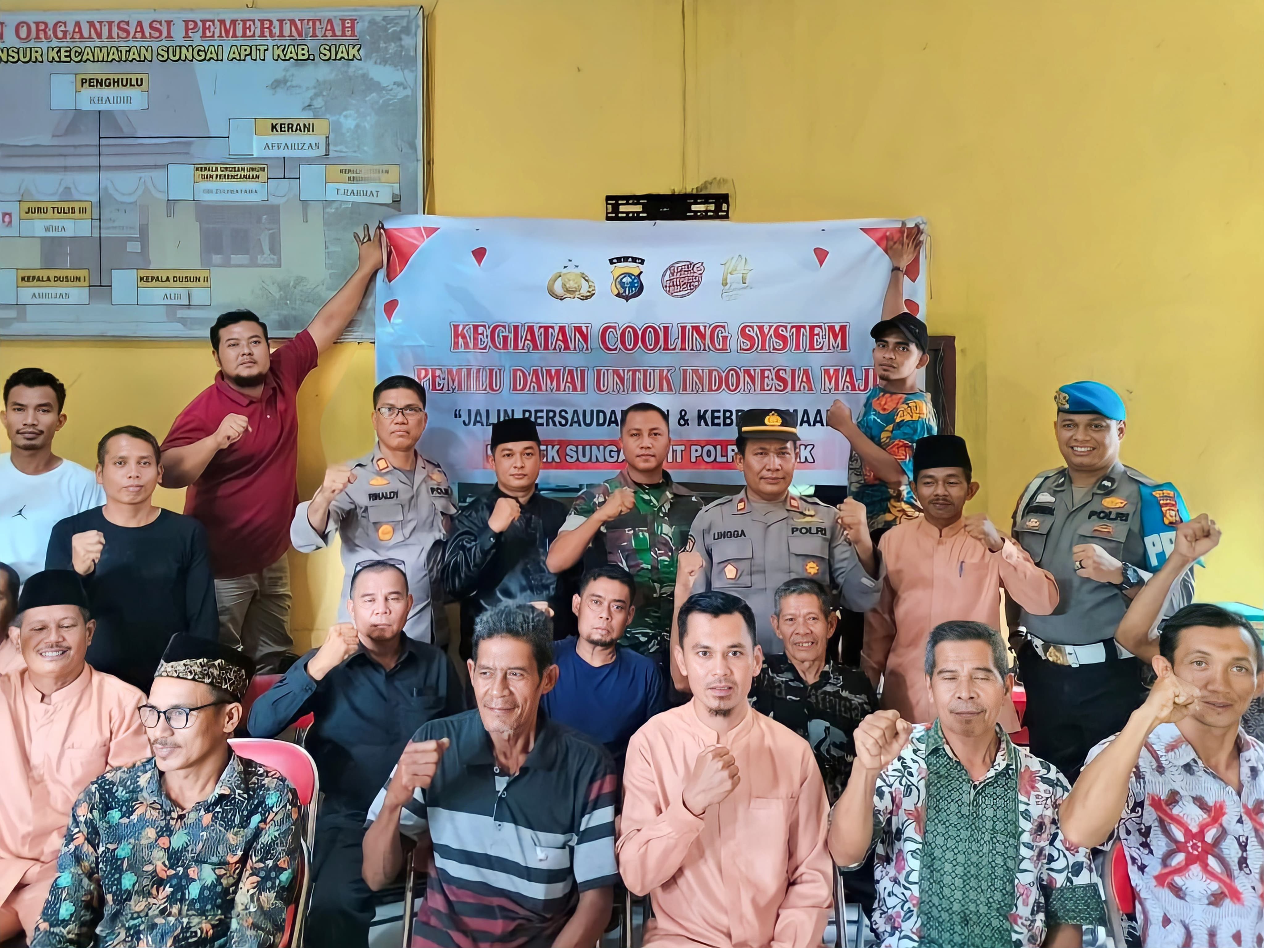 Kapolsek Sungai Apit Laksanakan Cooling System Pemilu Damai 2024 di Kampung Bunsur